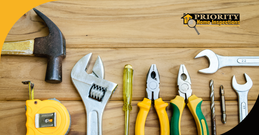 a set of tools laid out neatly on a wooden surface